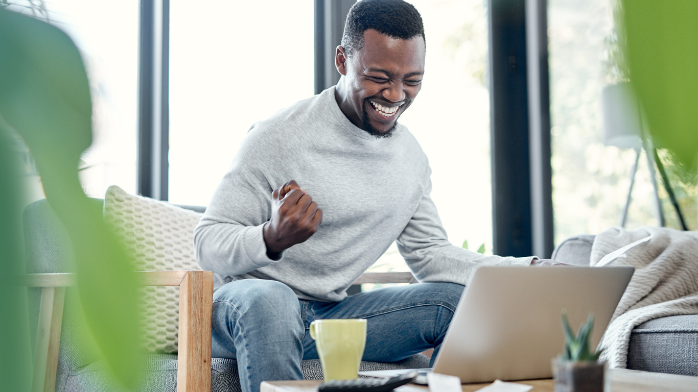 Man celebrating financial success